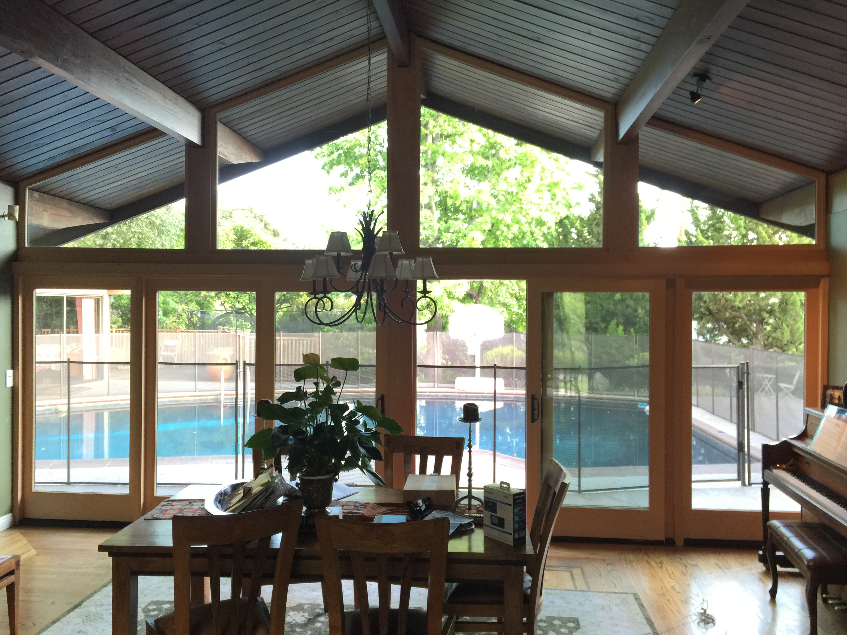 Mid century modern patio doors with wooden frame.